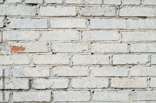 Soft image of a background of gray brick wall