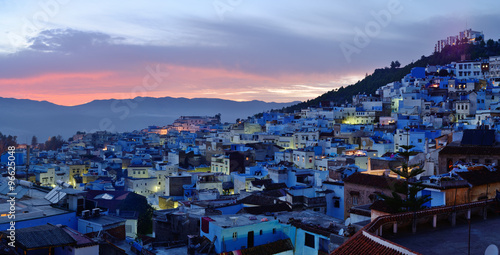 Morocco. Blue medina of Chefchaouen city at sunset photo