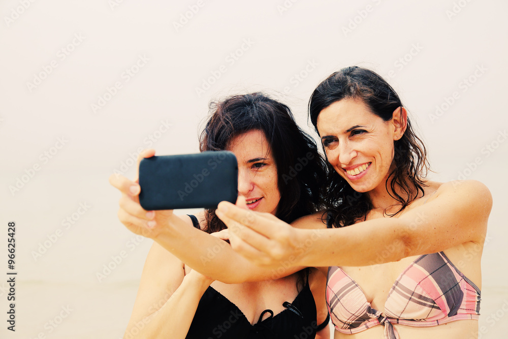 two best friends making selfie photo two best friends making selfie photo