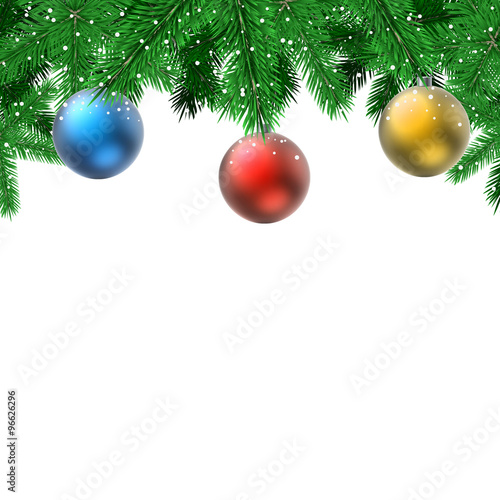 Fir branches with hanging decoration balls Christmas card with white copy space.