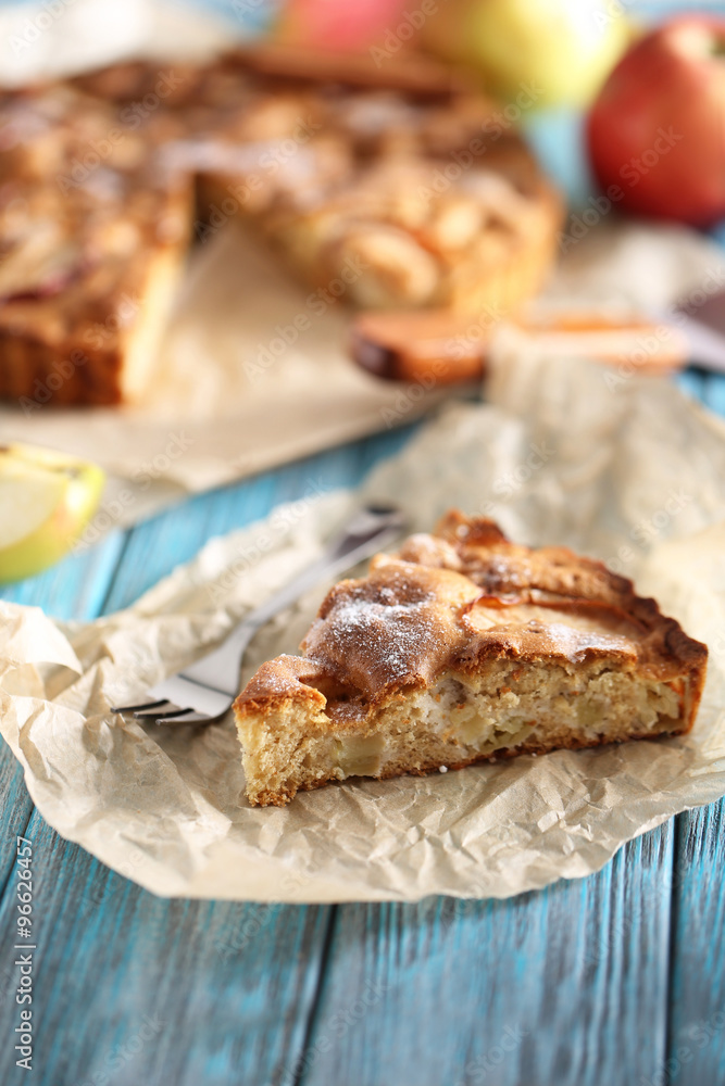 Homemade apple cake on blue wooden table Homemade apple cake on blue wooden table