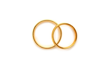 Golden wedding rings isolated on a white