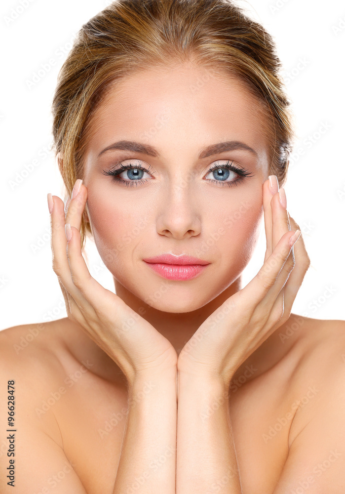Young woman touching her face isolated on white background Young woman touching her face isolated on white background
