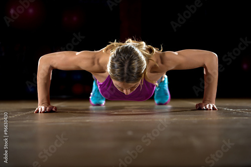 blonde girl exercise push up