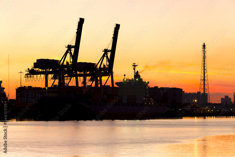 Container cargo freight ship silhouette in the morning, in Bangk