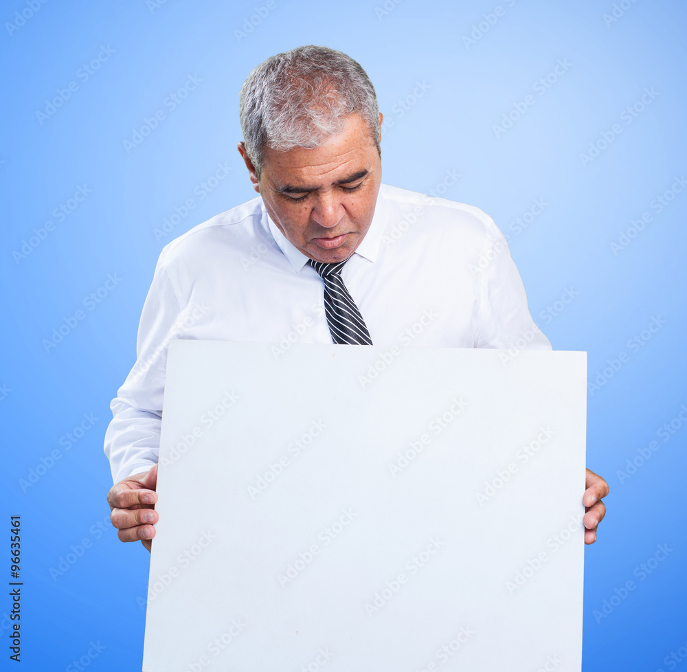 mature man holding a banner mature man holding a banner