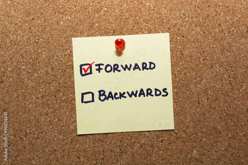 Checkbox with two options, forward and backwards, pinned on a board