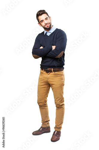 full body man crossing arms