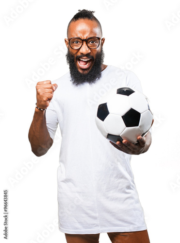 black man holding a soccer ball