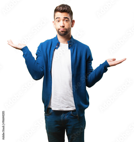 young man doing a balance gesture