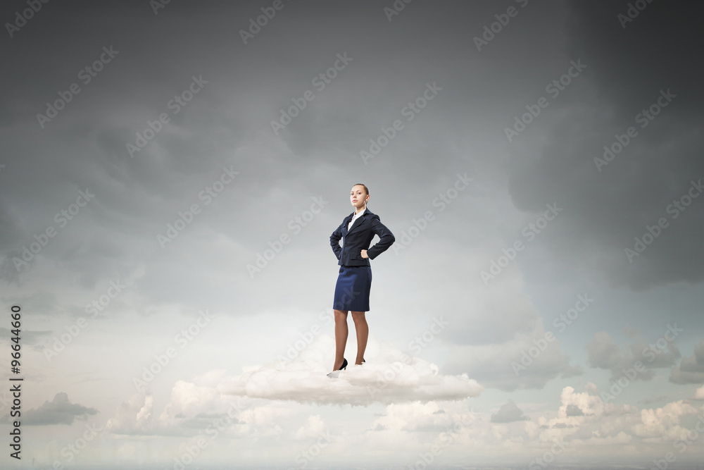 Successful businesswoman on cloud Successful businesswoman on cloud