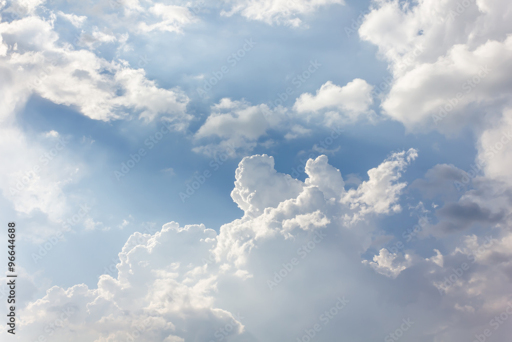 Beautiful light blue sky with puffy white clouds Beautiful light blue sky with puffy white clouds