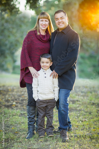 Young Mixed Race Family Por...