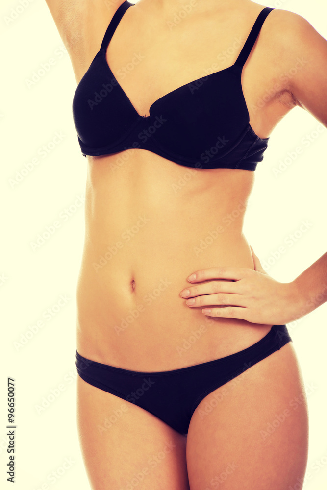 Woman standing in bikini. Woman standing in bikini.