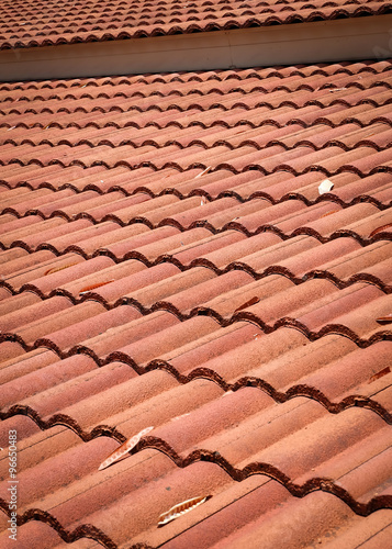 brown tile roof weathered on building residential