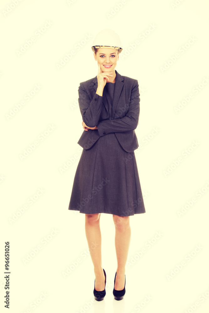 Business woman wearing white helmet. Business woman wearing white helmet.