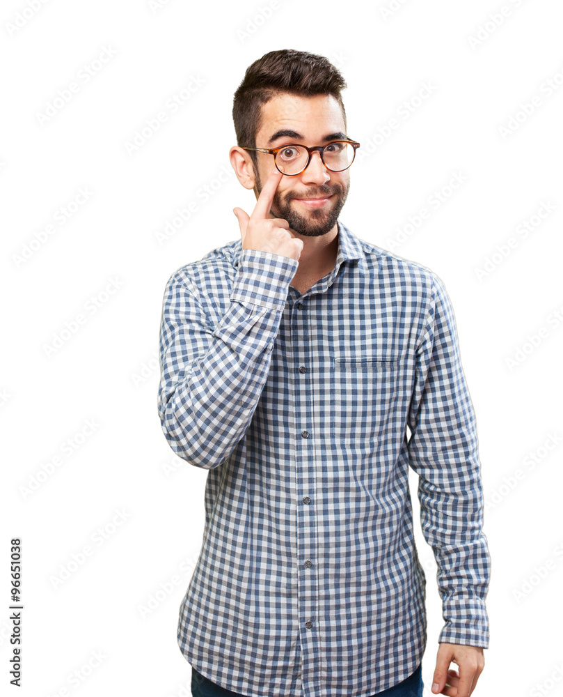 young man pointing his eye young man pointing his eye