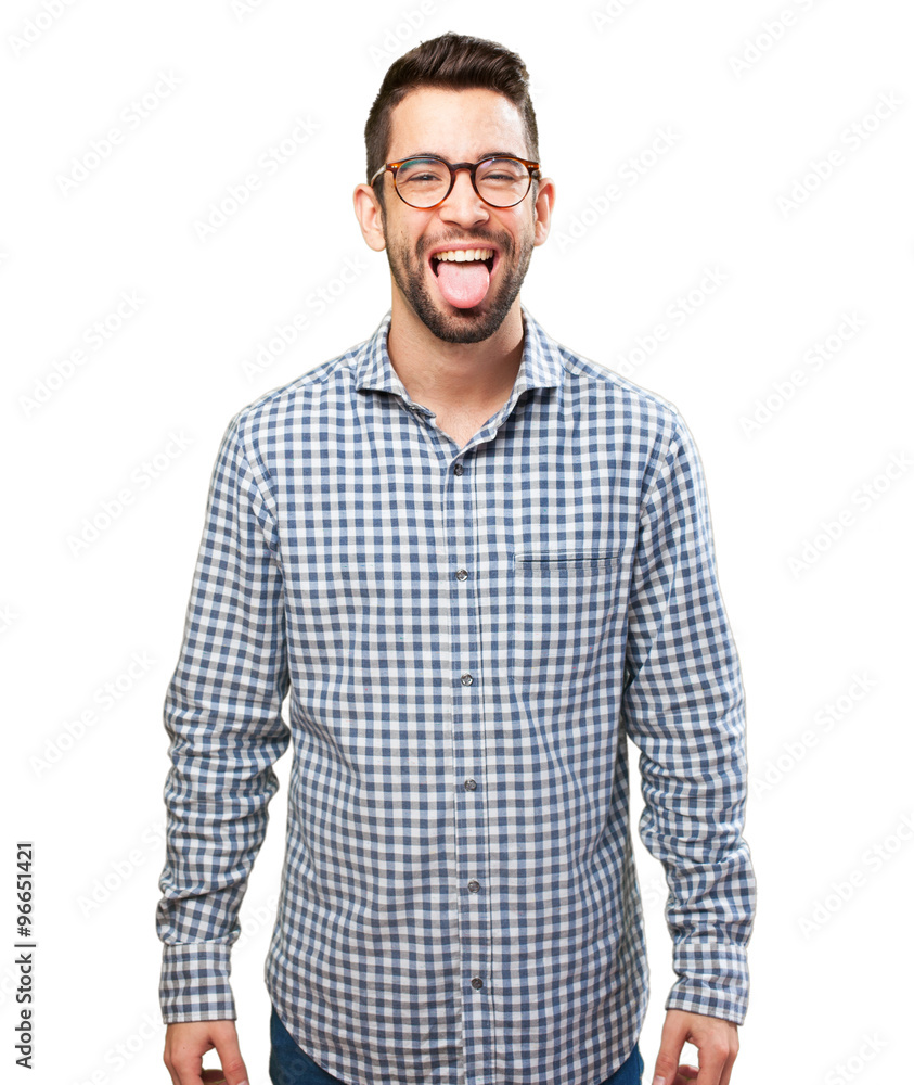 young man showing his tongue young man showing his tongue