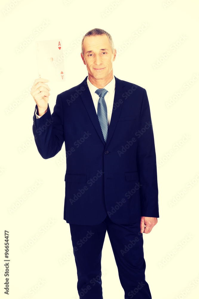 Elegant business man with red ace card Elegant business man with red ace card