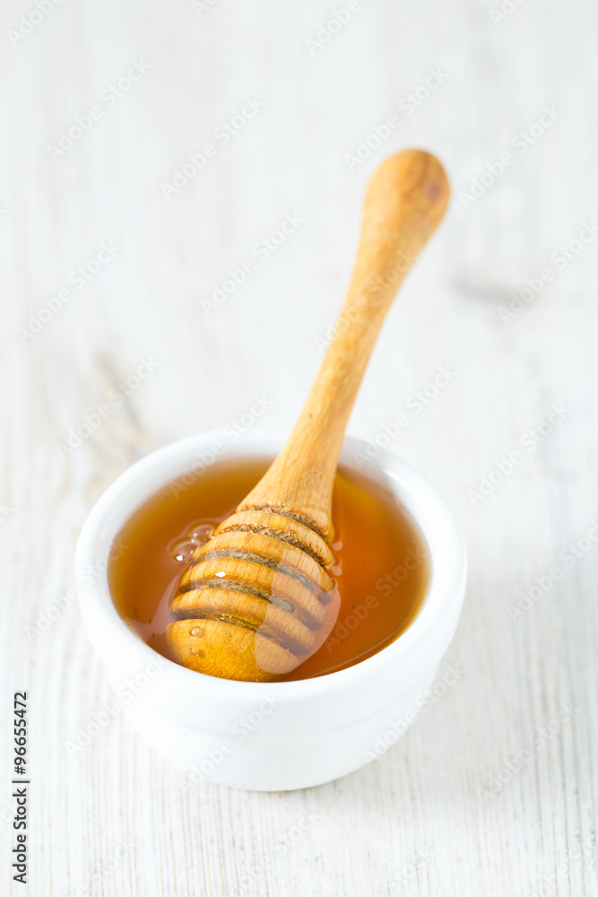 honey on wooden surface honey on wooden surface