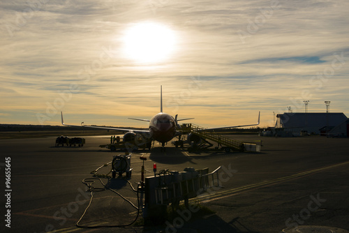 Evening light at airport. Travel easy, convenient and safe by pl