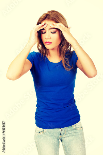 Young woman with headache.