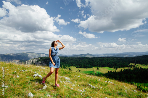  woman relax on hill with exciting landscape in mountains © shevtsovy