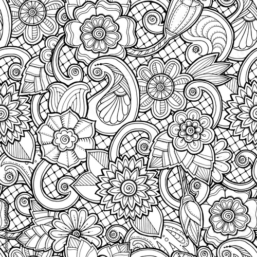 Seamless background in vector with doodles, flowers and paisley.