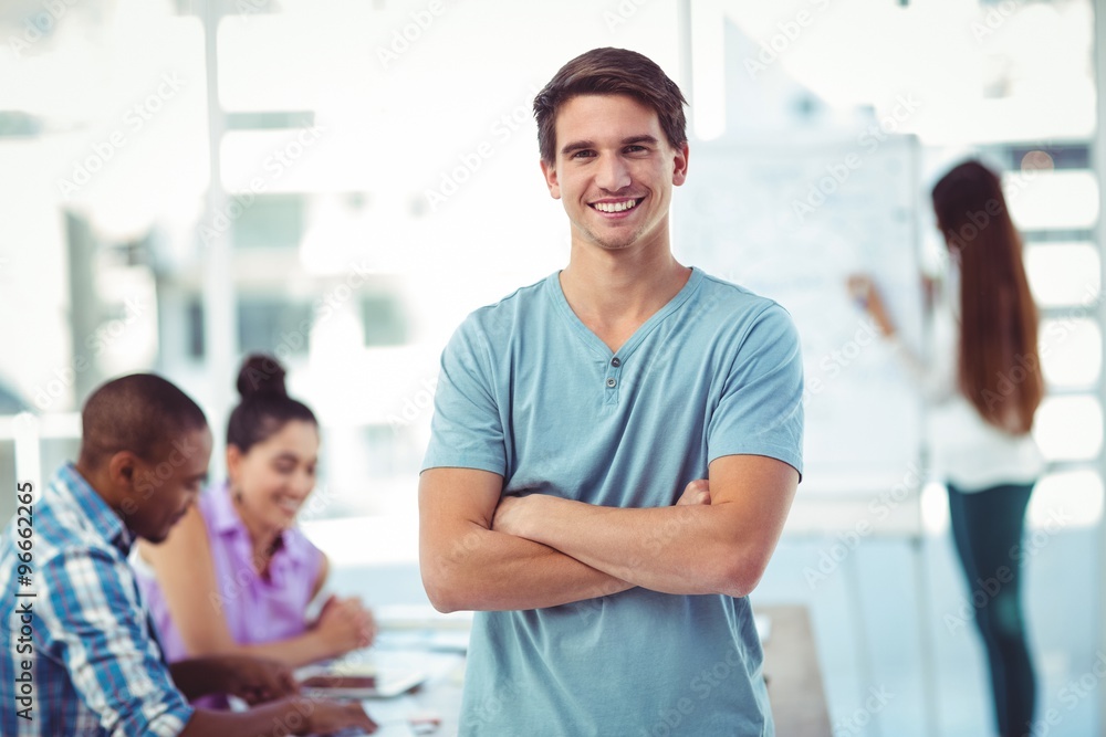 Young creative worker smiling at camera Young creative worker smiling at camera