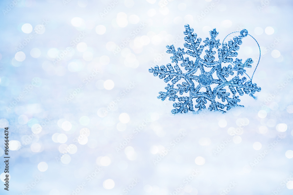 Defocused abstract snowflakes on snow bokeh. Defocused abstract snowflakes on snow bokeh.