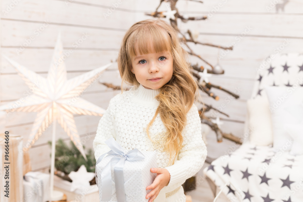 Little girl in christmas decorations Little girl in christmas decorations