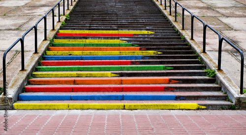 Stairway concept  in the form of pencils of rainbow colors contrasted photo