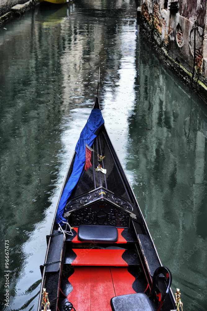  Gondolas on canal in Venice