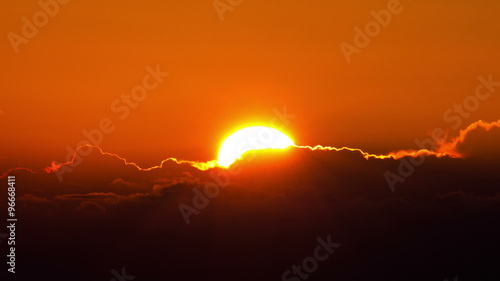 4K sunrise timelapse close up over horizon mountain clouds photo