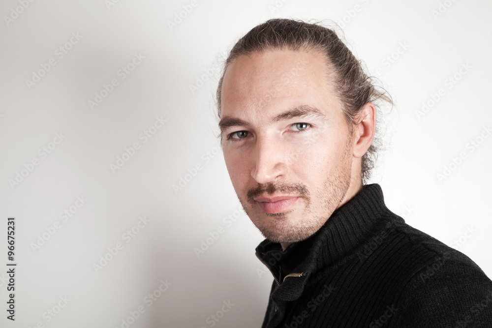 Closeup studio portrait of young man on white Closeup studio portrait of young man on white
