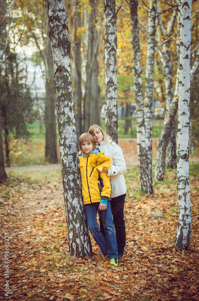 Mother and little son in park or forest, outdoors. Mother and little son in park or forest, outdoors.