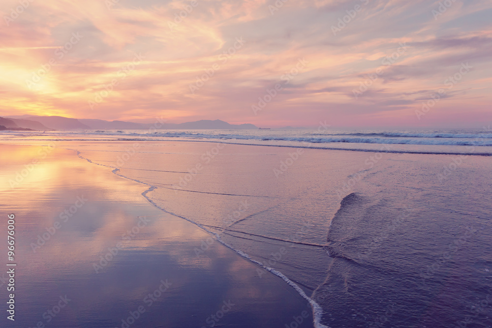 beach shore on summer at sunset