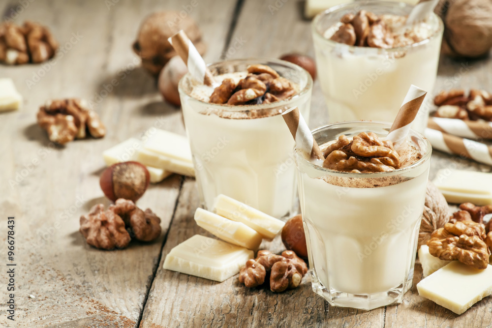 Dessert of white chocolate and walnuts, selective focus Dessert of white chocolate and walnuts, selective focus