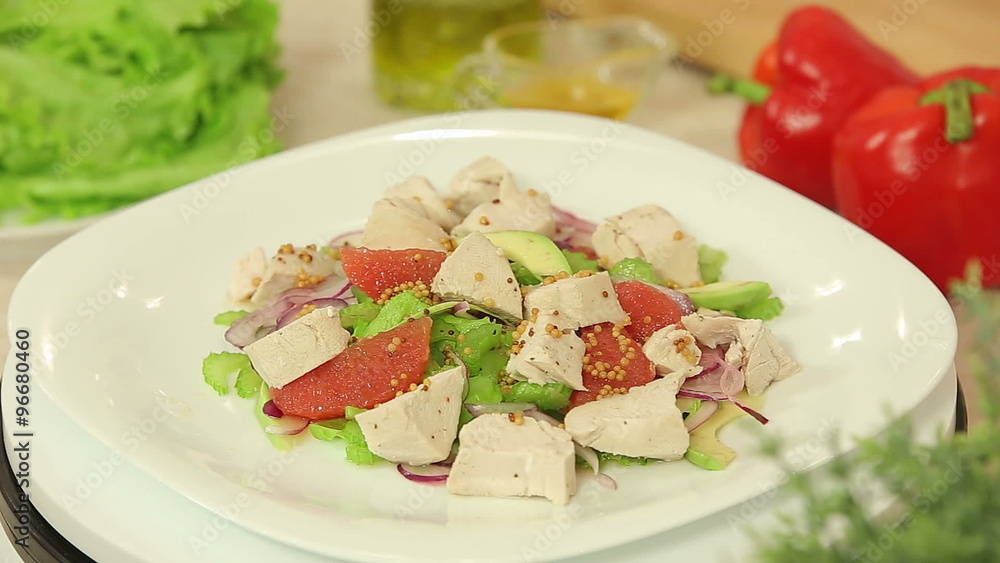 Fresh salad with orange and chicken fillet
