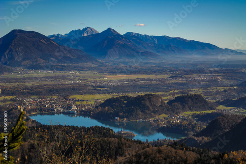 View at Lake Bled from Pokljuka with Karavanke mountain range in the background.