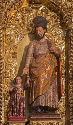 Cordoba - The carved polychrome baroque statue of st. Joseph