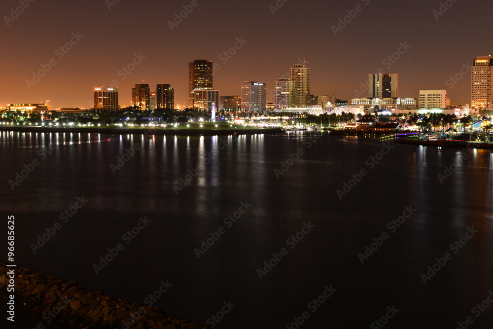 Fototapeta premium The night skyline of Long Beach, Los Angeles taken from the Queen Mary.