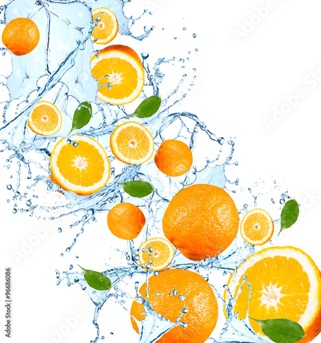 Fresh fruits  orange falling in water splash  isolated on white background
