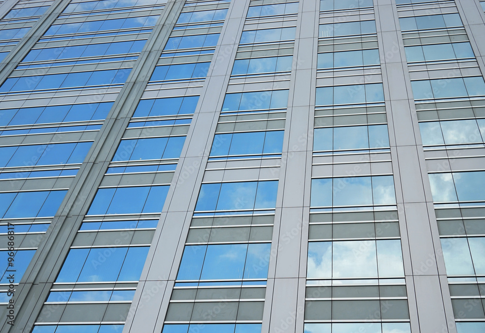 mirror of sky on glass of building mirror of sky on glass of building