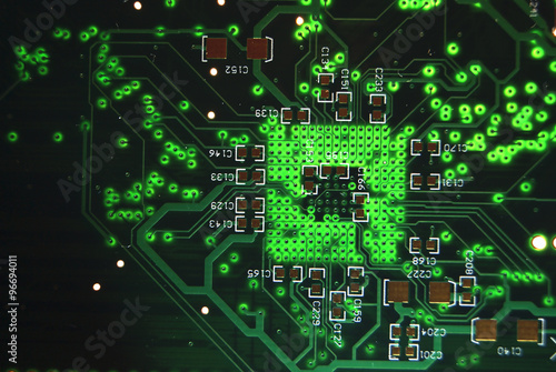 Printed circuit board closeup green electronic background
