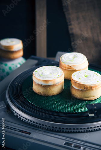 Tartlets with lime cream and meringue.Lemon pie. photo