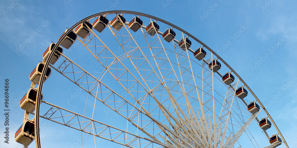 Ferris Wheel in Blue Sky