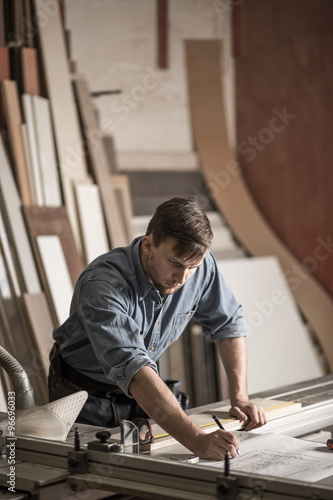 Skilled carpenter working with precision