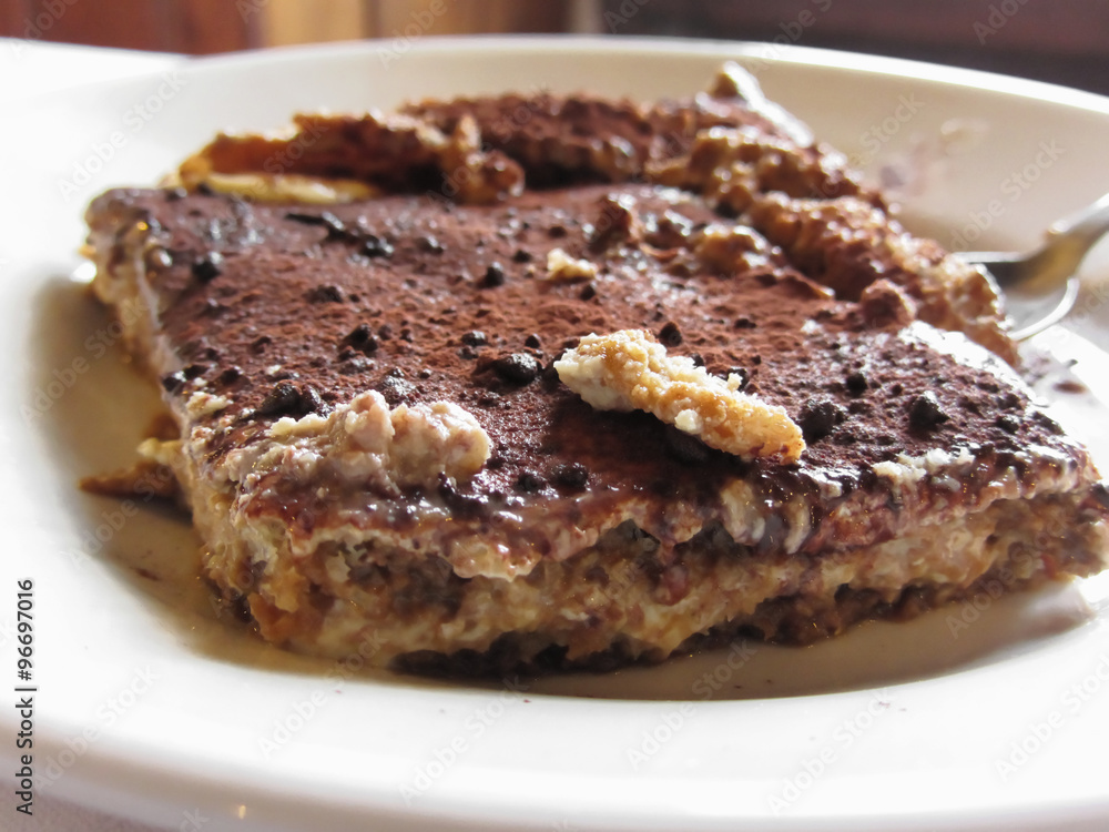 Tiramisu cake . Italian classical dessert with mascarpone and coffee Tiramisu cake . Italian classical dessert with mascarpone and coffee