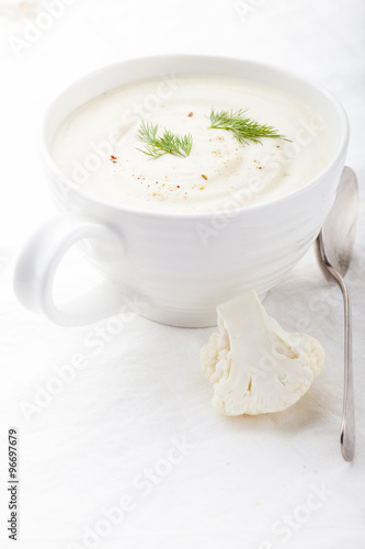 Cauliflower soup with dill and seasoning. Healthy food